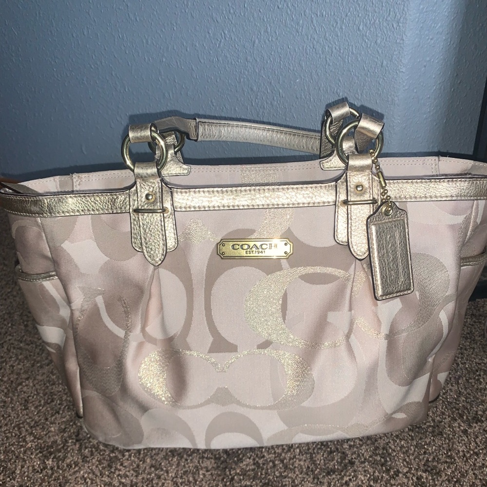 Gold coach bag